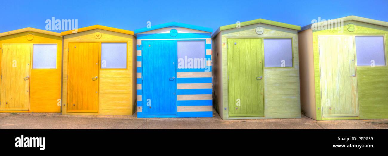 Beach huts bright colours with green blue and yellow panoramic view in HDR Stock Photo