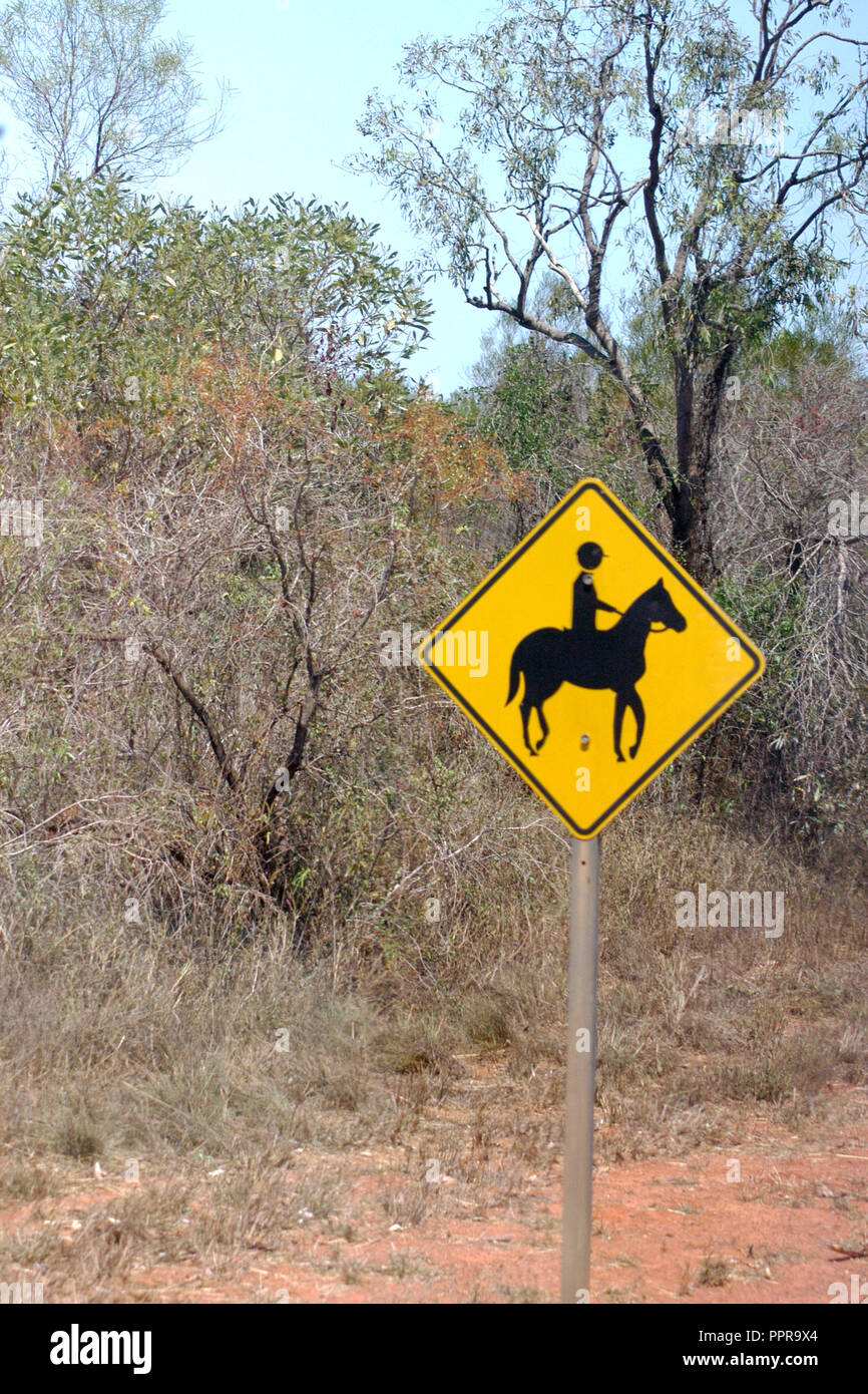 A ROAD SIGN WARNS DRIVERS THAT HORSE RIDERS CROSS ON THIS SECTION OF THE ROAD, NEW SOUTH WALES, AUSTRALIA Stock Photo