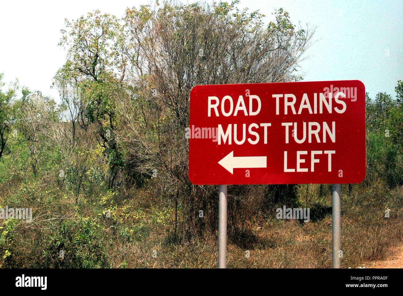 ROAD TRAINS 'MUST TURN LEFT' SIGN, WESTERN AUSTRALIA Stock Photo