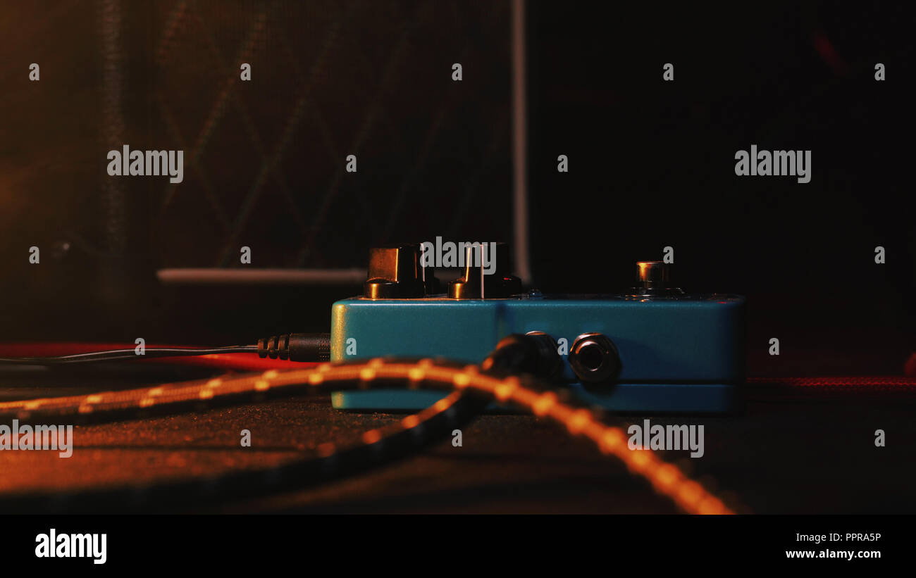 loop pedal for electric guitar. Close up of effect machine on concert