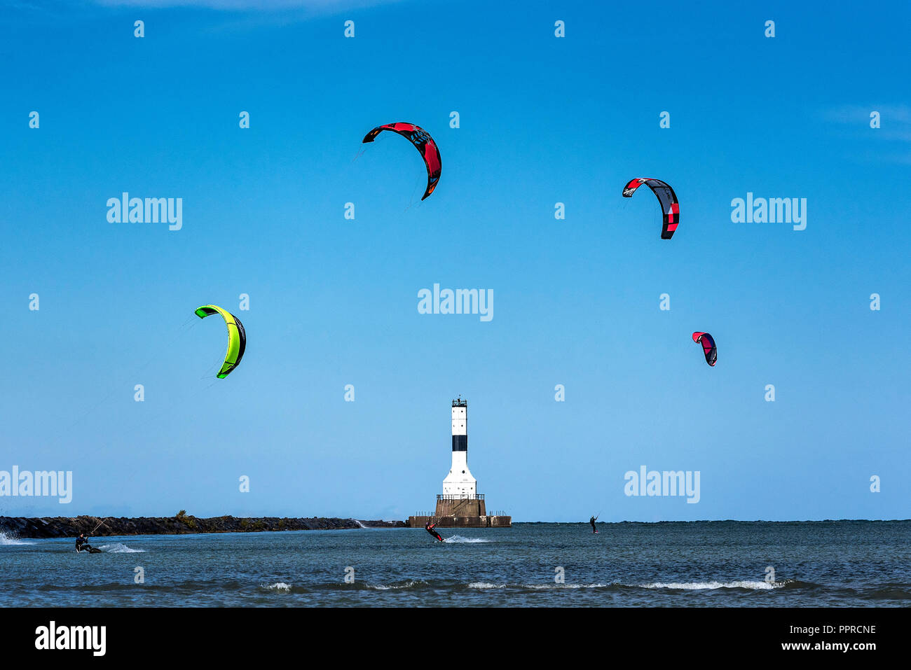 Kitesurfing, Conneaut West Breakwater Lighthouse, Lake Erie, Conneaut, Ohio, USA. Stock Photo