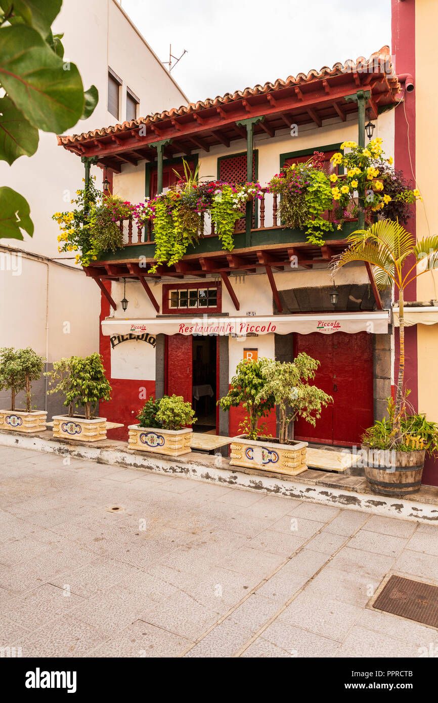 Traditional wooden balconies on the facades of Restaurant Piccolo, along the Avenida Maritima in santa Cruz de La Palma, Canary Islands, Spain Stock Photo
