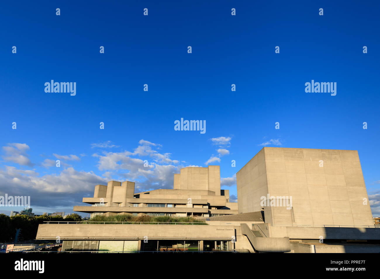 The National Theatre exterior with blue sky, Southbank, South Bank, London, UK Stock Photo