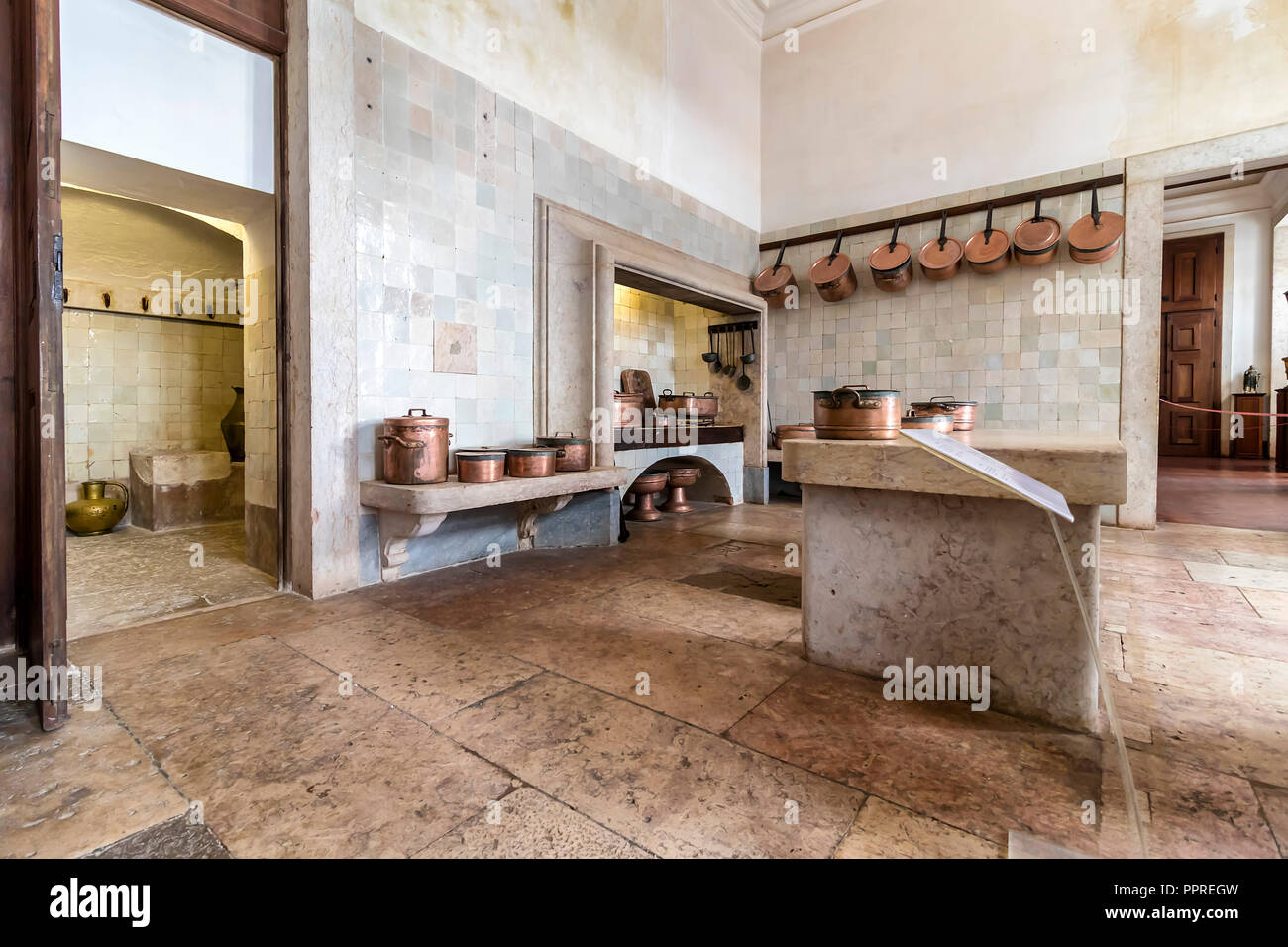 Mafra, Portugal - December 10, 2017:  Antique kitchen inside Mafra National Palace, Convent and Basilica. Franciscan Religious Order. Baroque. Stock Photo