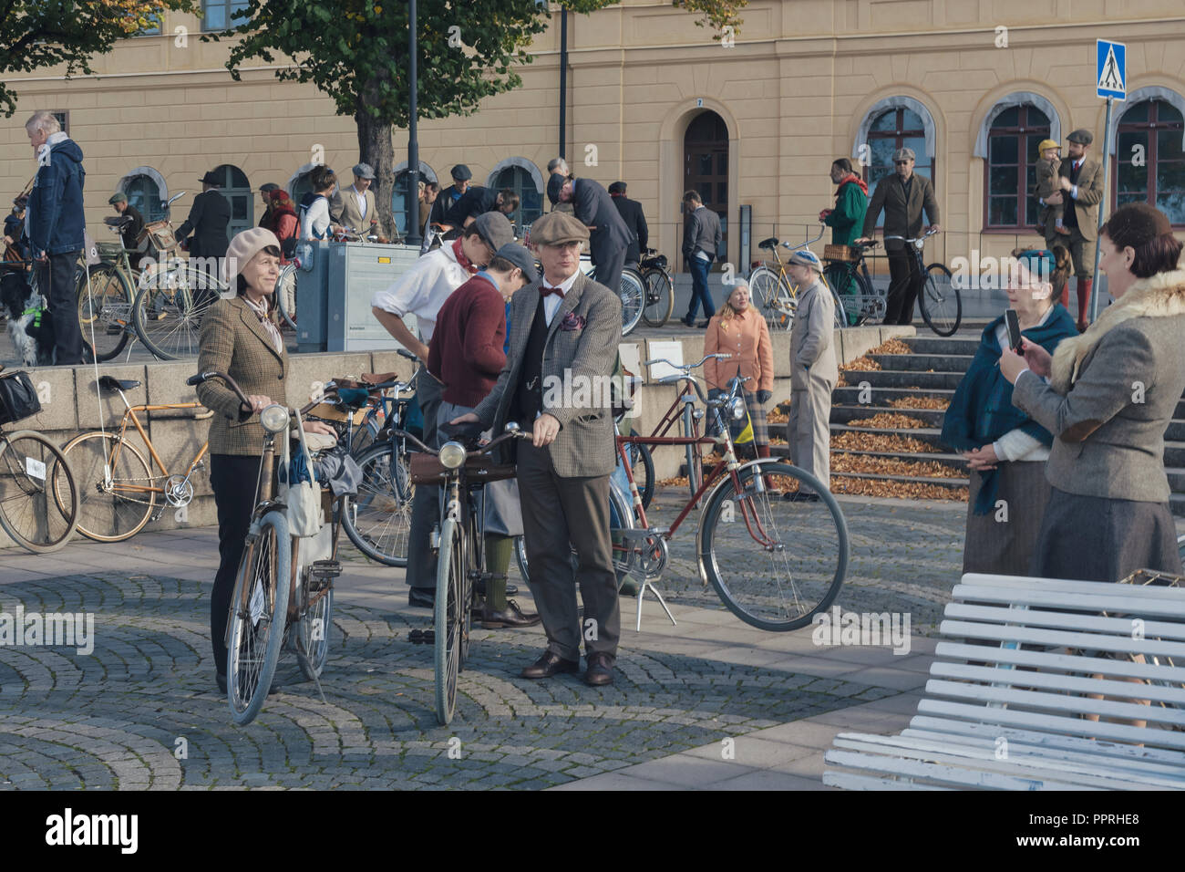 STOCKHOLM, SWEDEN, SEPT 22, 2018: Bike in tweed bicycle tour with vintage  bikes and clothes. Before start with backdrop of city hall Stock Photo -  Alamy