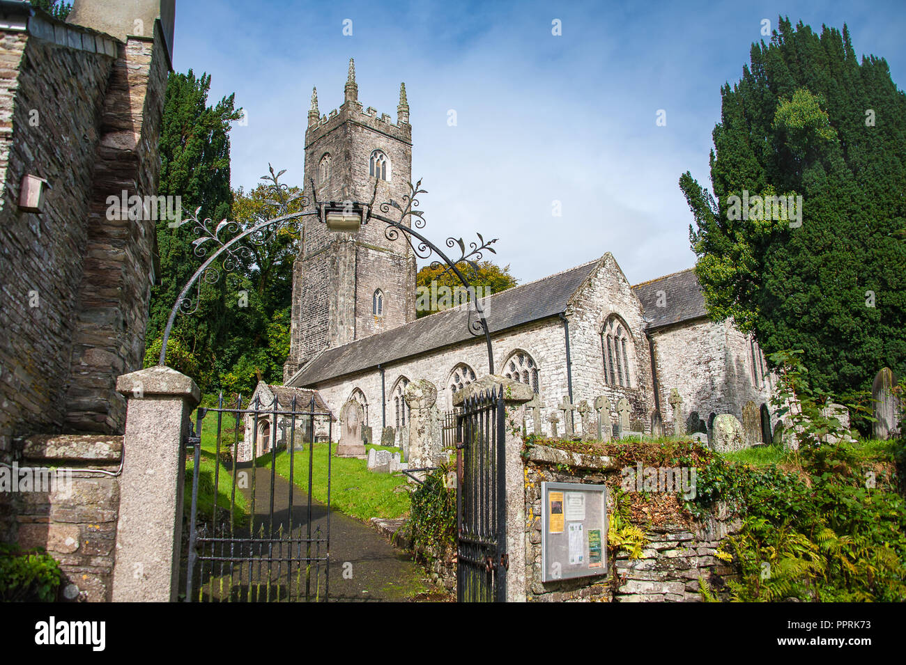 Picturesque Church of St Nonna, or Cathedral on the Moor at Altarnun, near Bodmin, Cornwall. Beautiful Norman building, in a green, grassy churchyard Stock Photo