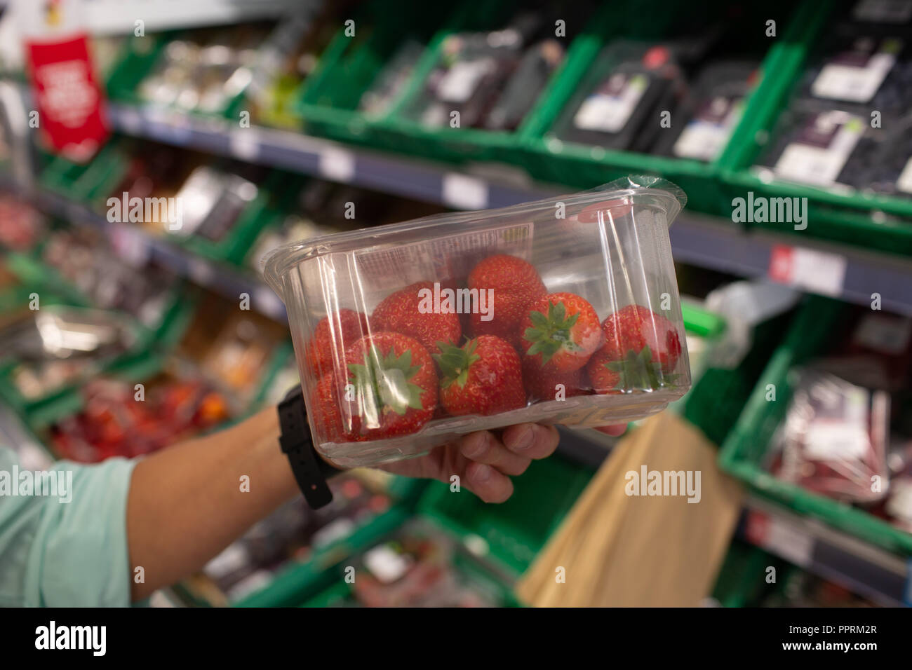 Plastic packaging on fruit and vegetables in the UK Stock Photo Alamy