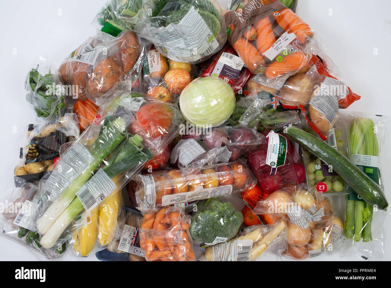 Plastic packaging on fruit and vegetables in the UK Stock Photo