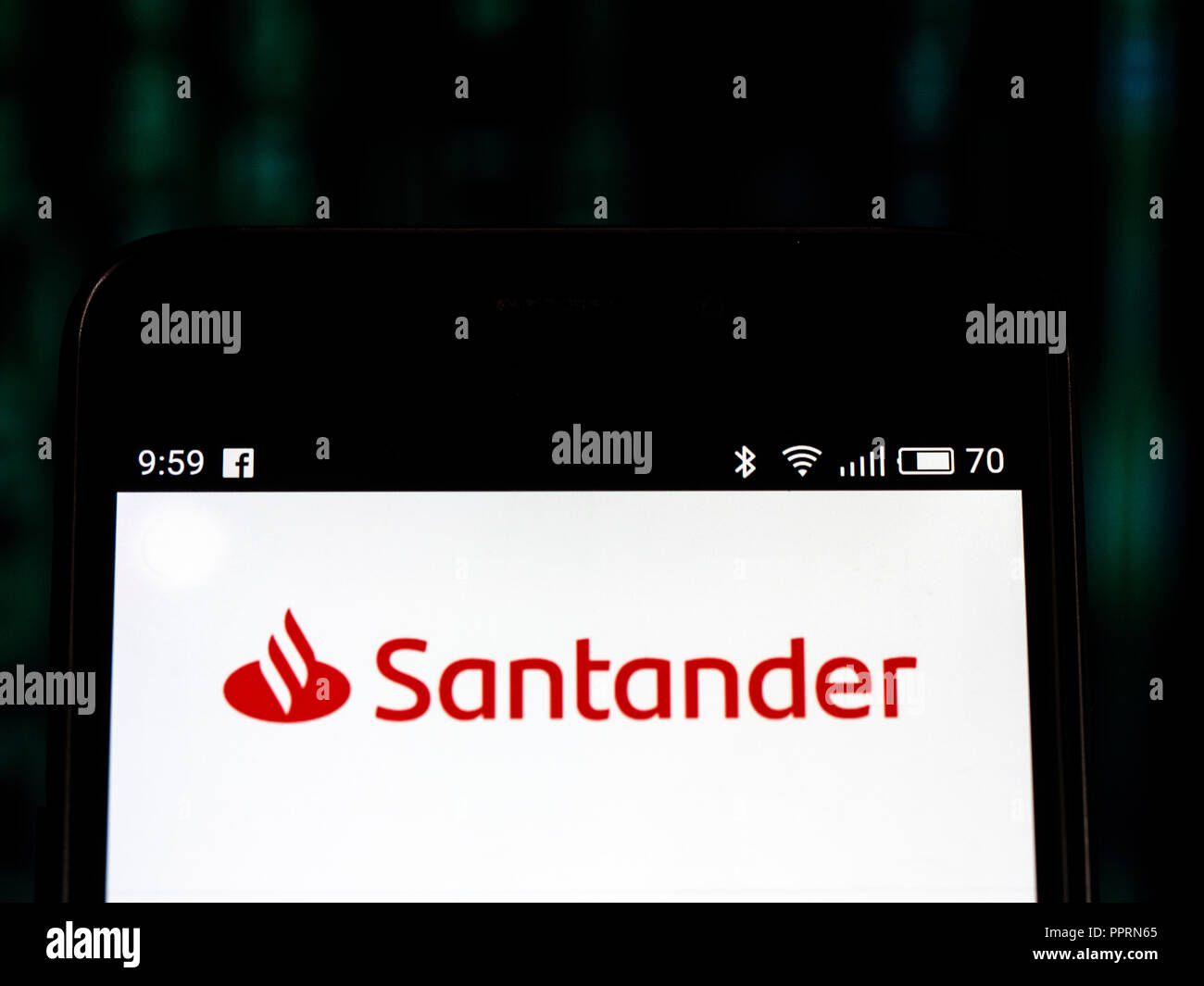 Banco Santander logo seen displayed on smart phone. Santander Group is