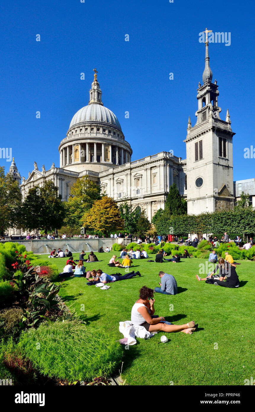 People relaxing at lunchime by St Paul's Cathedral, London, England, UK. Stock Photo