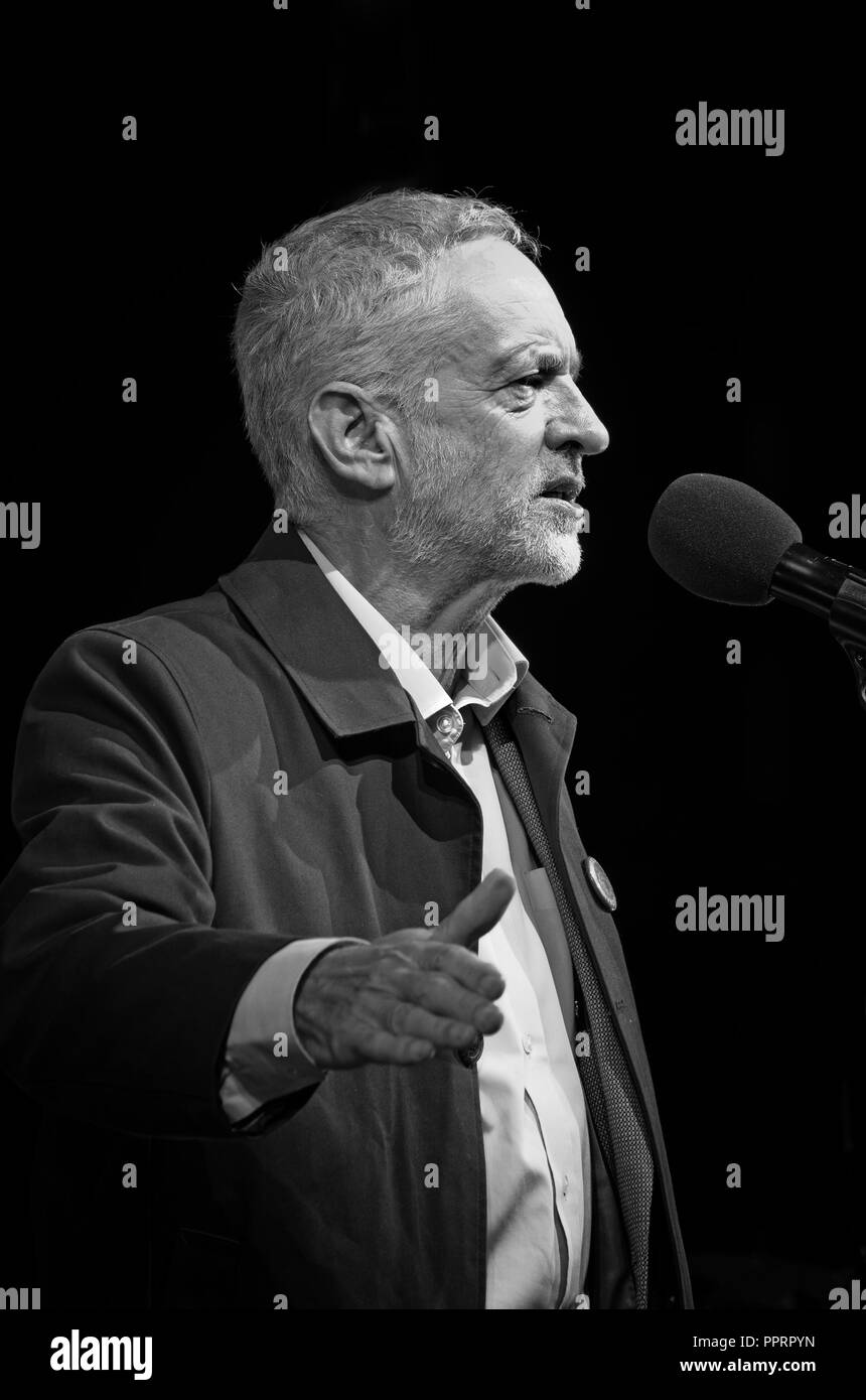 Monochrome side view portrait image of Labour leader Jeremy Corbyn giving a speech on stage at the pre conference rally in Liverpool 2018. Stock Photo