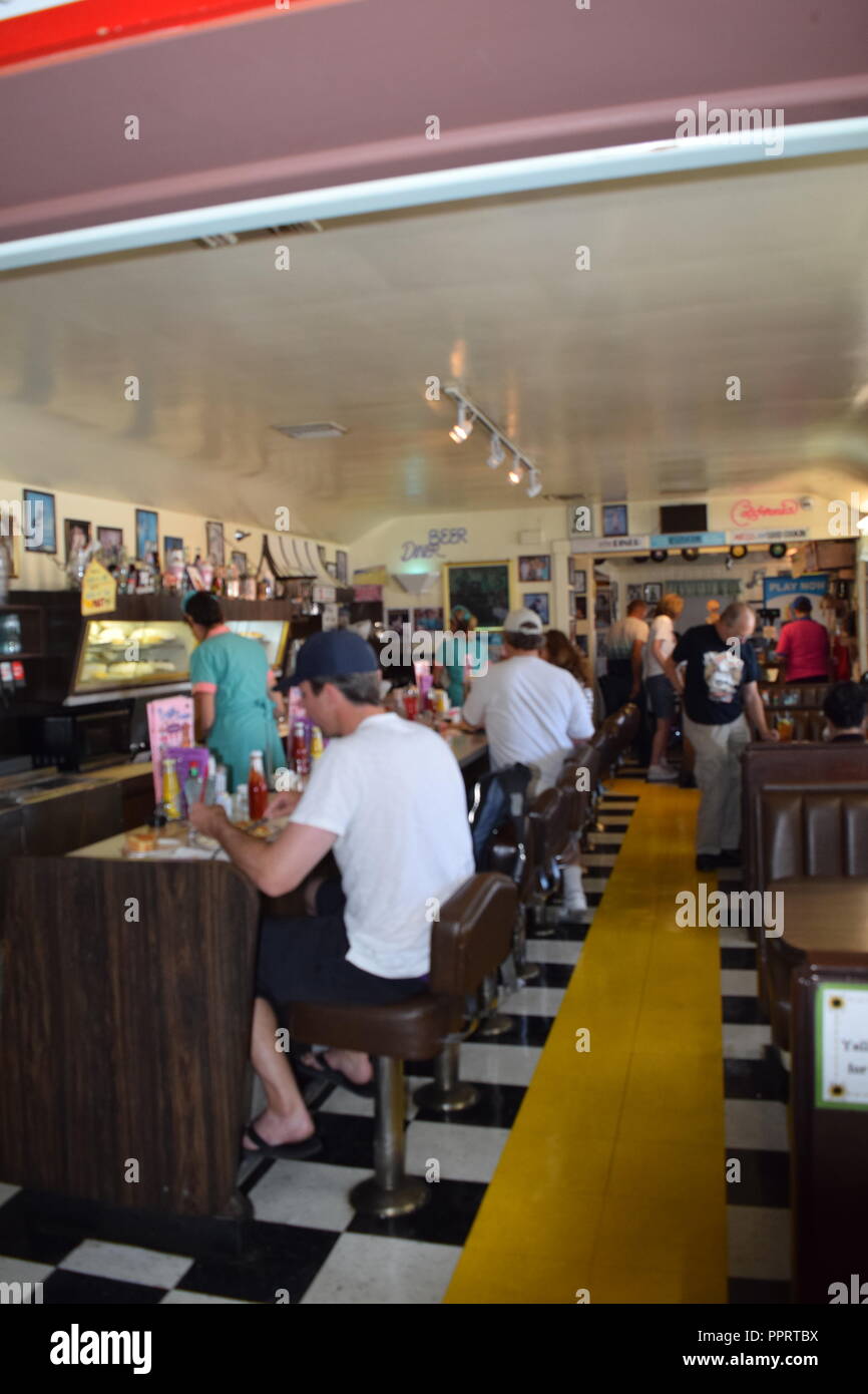 People eating at Peggy Sues diner, in Yermo California. This historic diner is between Los Angeles and Las Vegas. Stock Photo