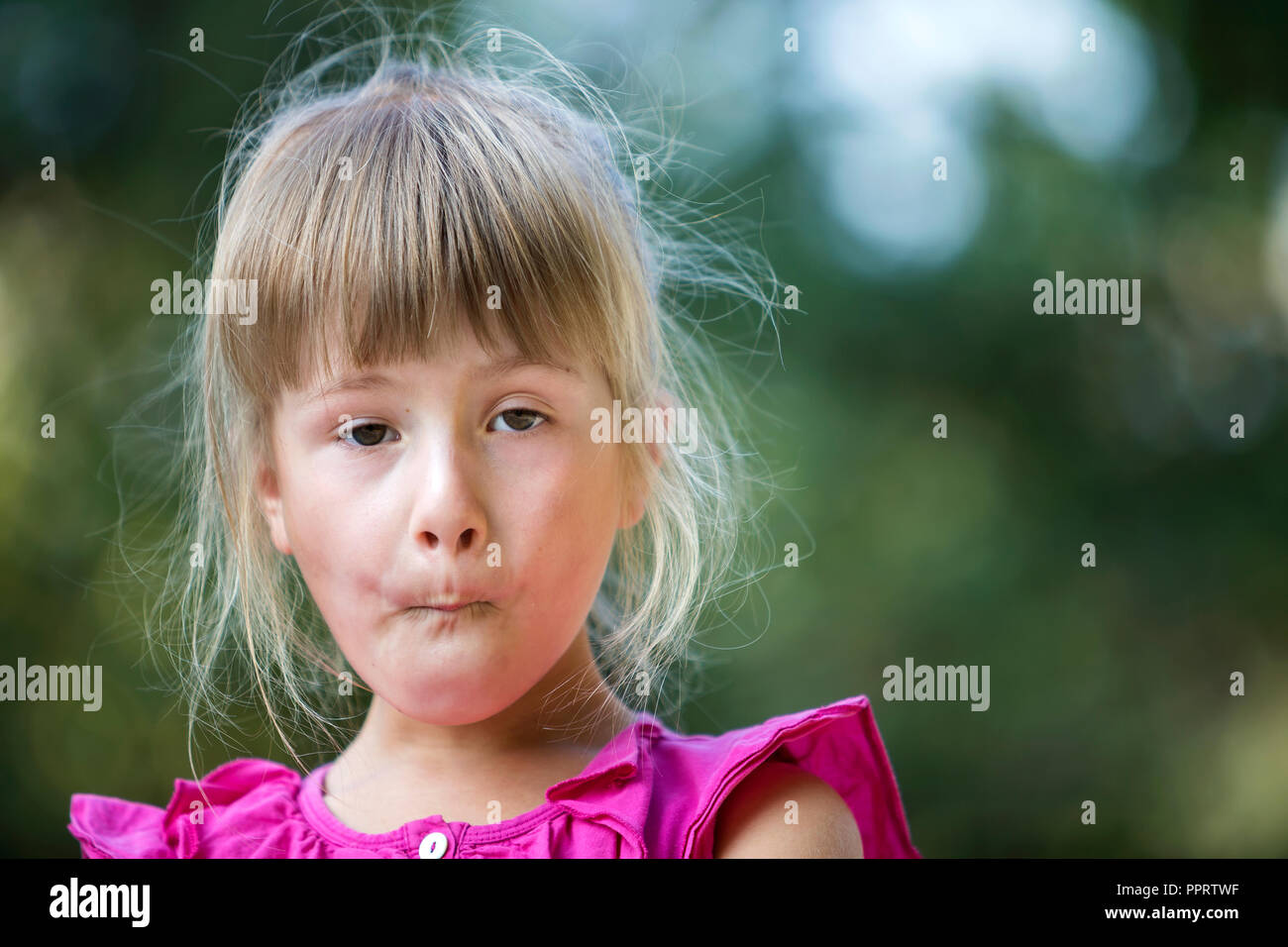 Portrait Of Little Cute Pretty Young Child Girl With Gray Eyes And