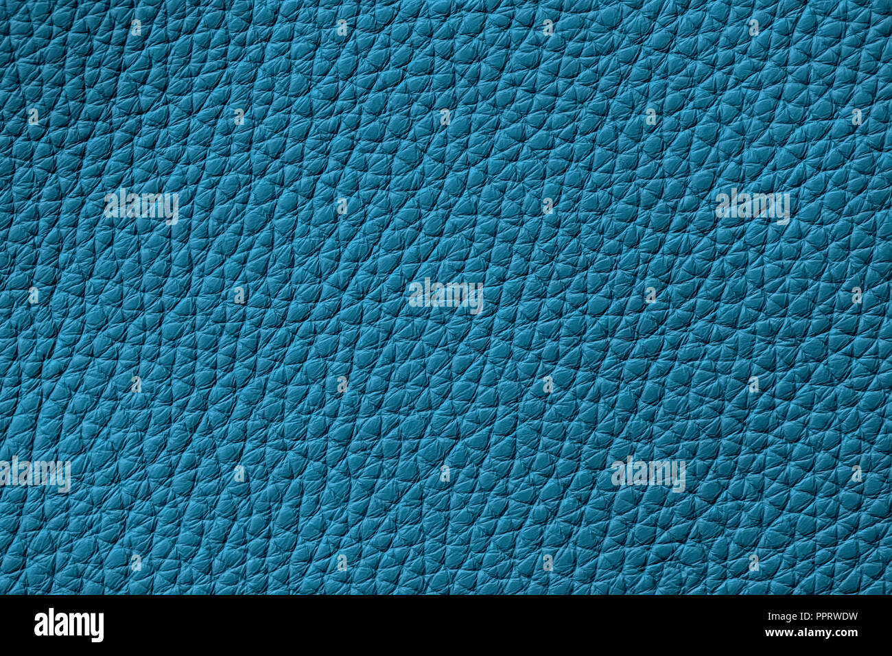 Texture of genuine leather, turquoise color, background. For your