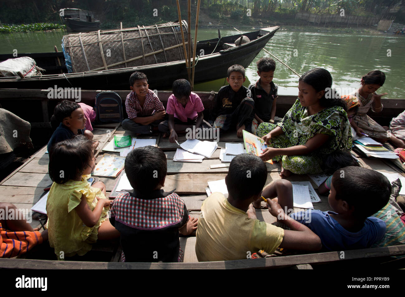 A floating school for gypsy children at Sahapur. Sonargaon, Narayanganj, Bangladesh. Stock Photo