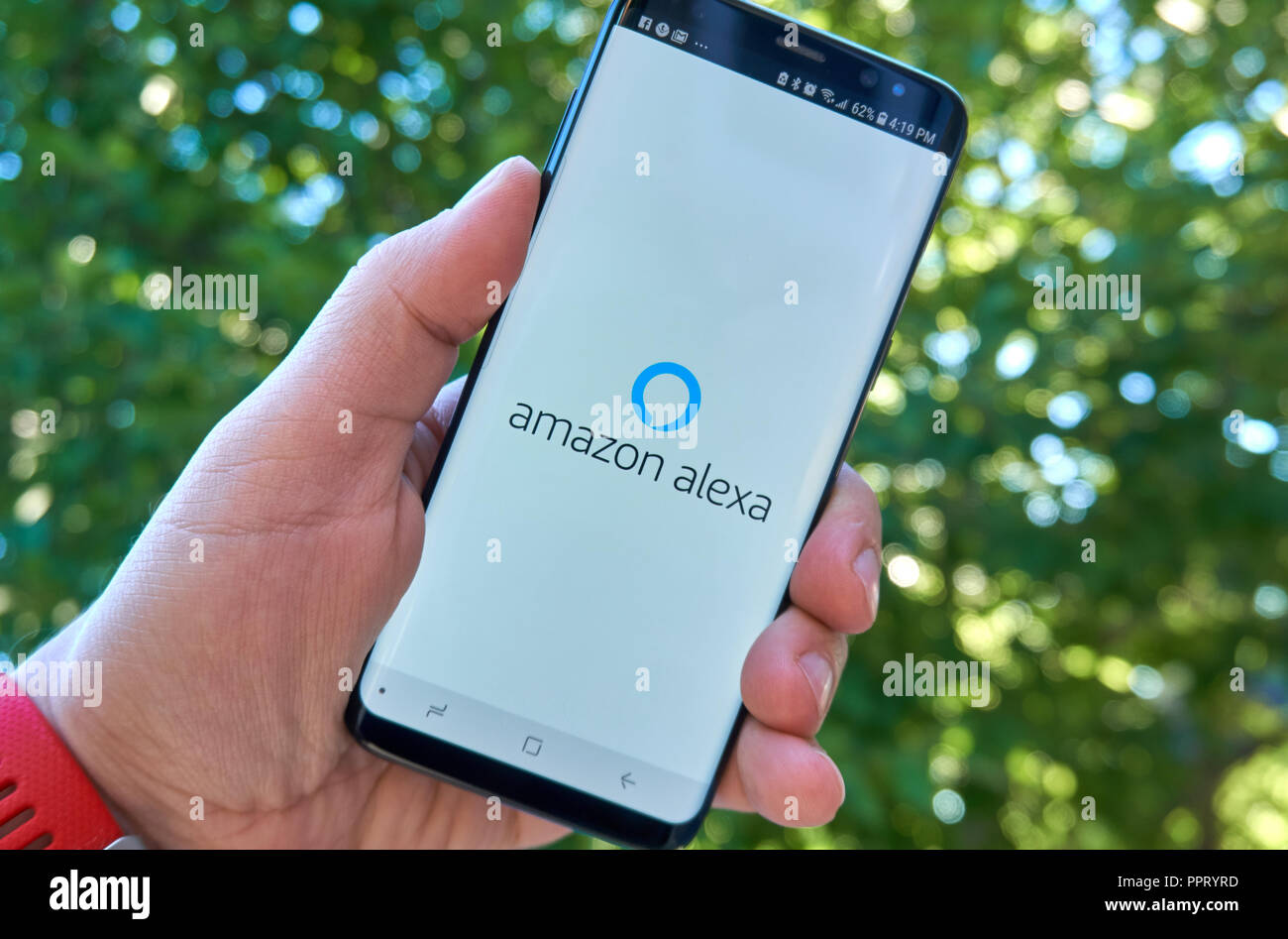 MONTREAL, CANADA - August 28, 2018: Amazon Alexa android app on Samsung s8  screen in a hand. Amazon Alexa is a virtual assistant developed by Amazon  Stock Photo - Alamy