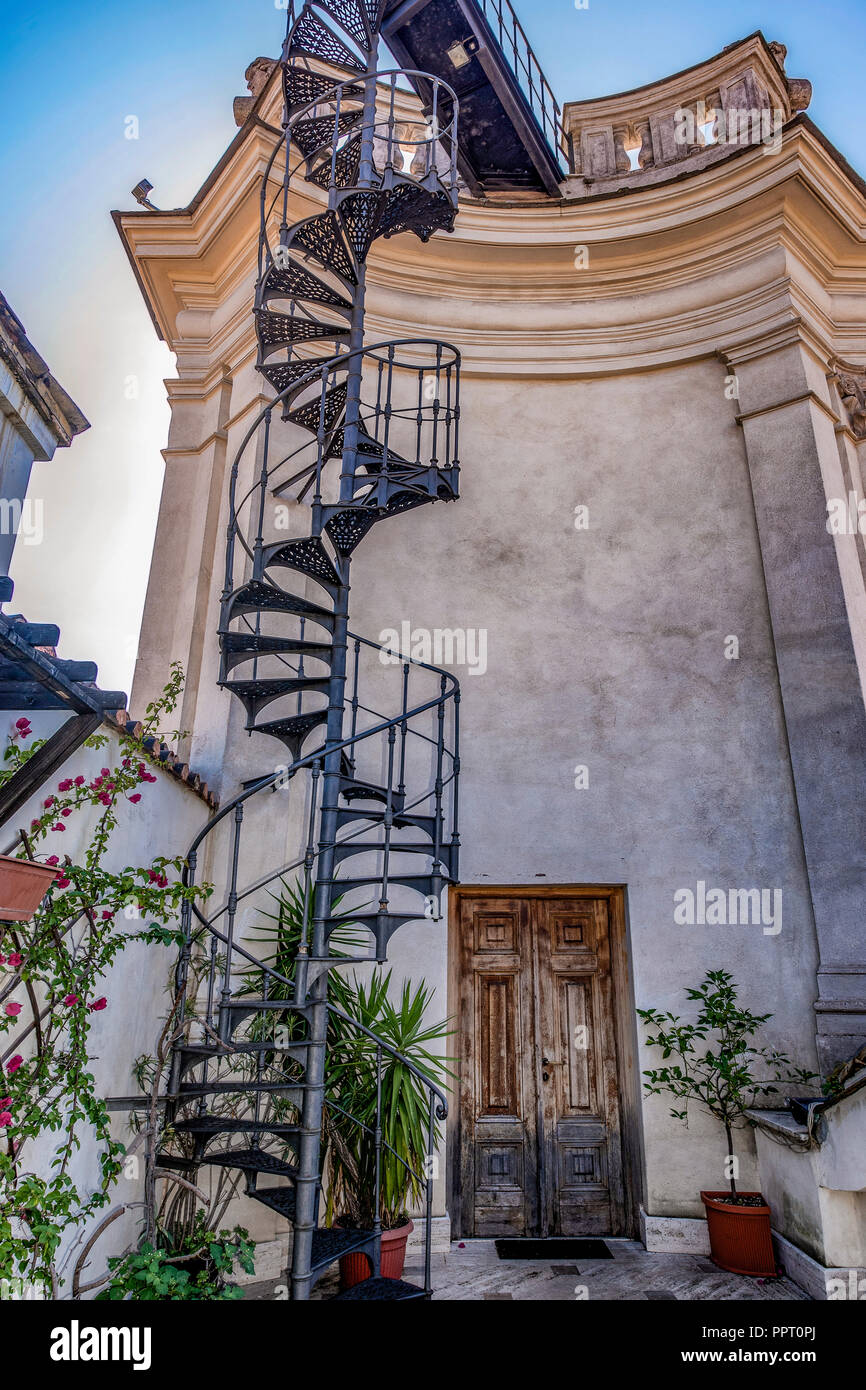 The spiral staircase that connects the last floor of Palazzo Falconieri of Rome with the 'Altana', a terrace  built by Francesco Borromini Stock Photo