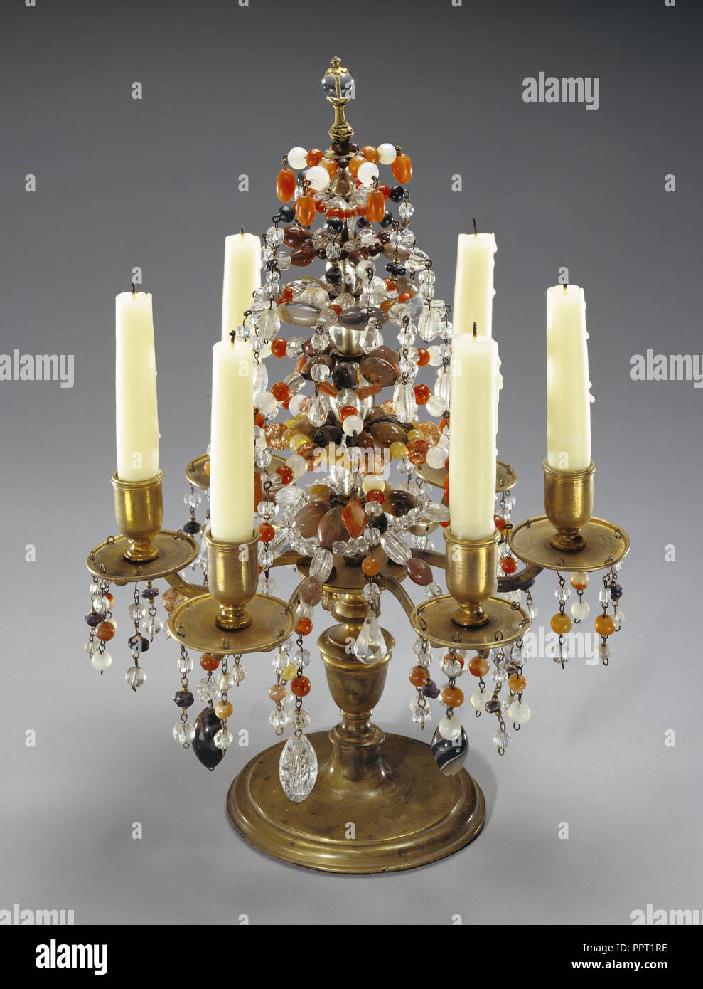 Girandole; Paris, France; about 1680 - 1690; Gilt bronze with beads and drops of rock crystal, coral, jasper, amethyst Stock Photo