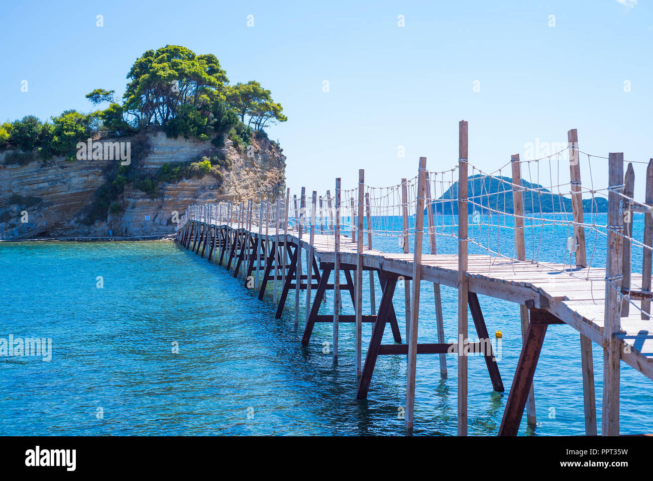 Wooden bridge on the small island of Cameo in Greece Stock Photo