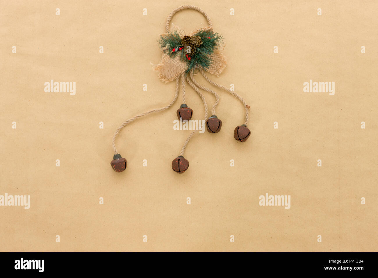 Cute retro Christmas decoration ornaments on a neutral natural paper background with space for copy Stock Photo