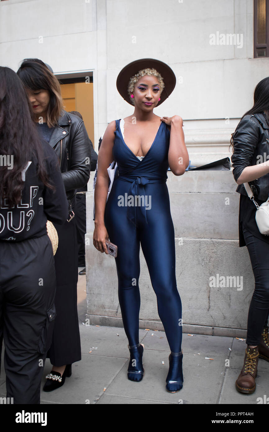 LONDON, United Kingdom- SEPTEMBER 14 2018: People on the street during the  London Fashion Week. Black girl in Lycra overall Stock Photo - Alamy