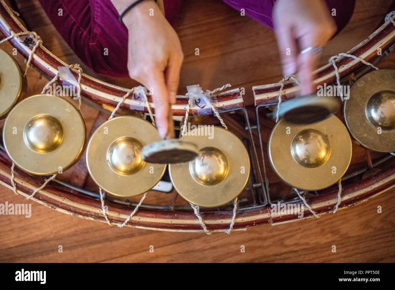 Cambodian music - Korng Thomm (Low-pitched circular frame gongs) Stock Photo