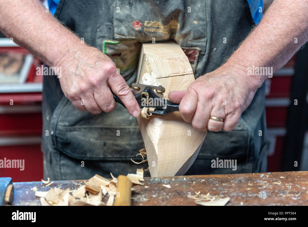 Decoy carving with draw knife Stock Photo Alamy