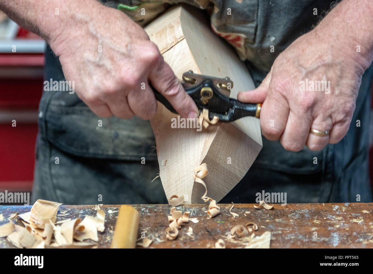 Decoy carving with draw knife Stock Photo Alamy