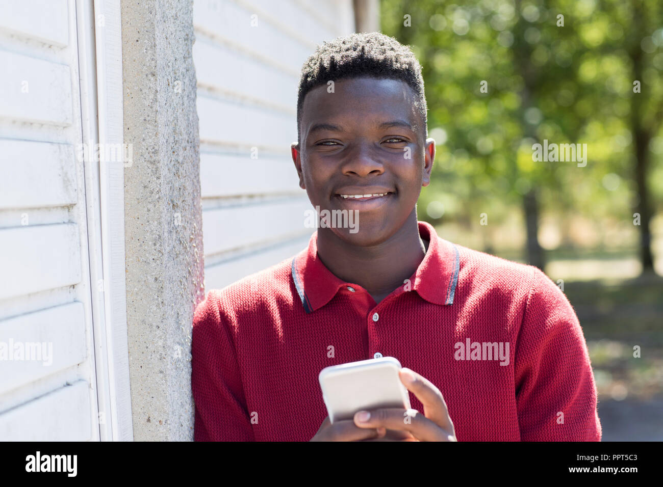 Boy Send Msg Portrait Of Teenage Boy Outdoors Sending Text Message From Mobile Phone ...
