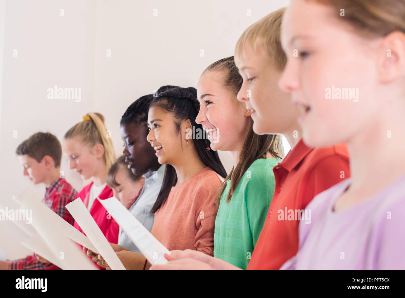 Group Of School Children Singing In Choir Together Stock Photo