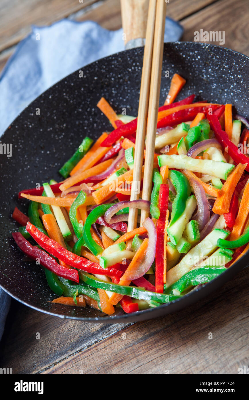chicken and vegetables on wok with soya sauce Stock Photo - Alamy