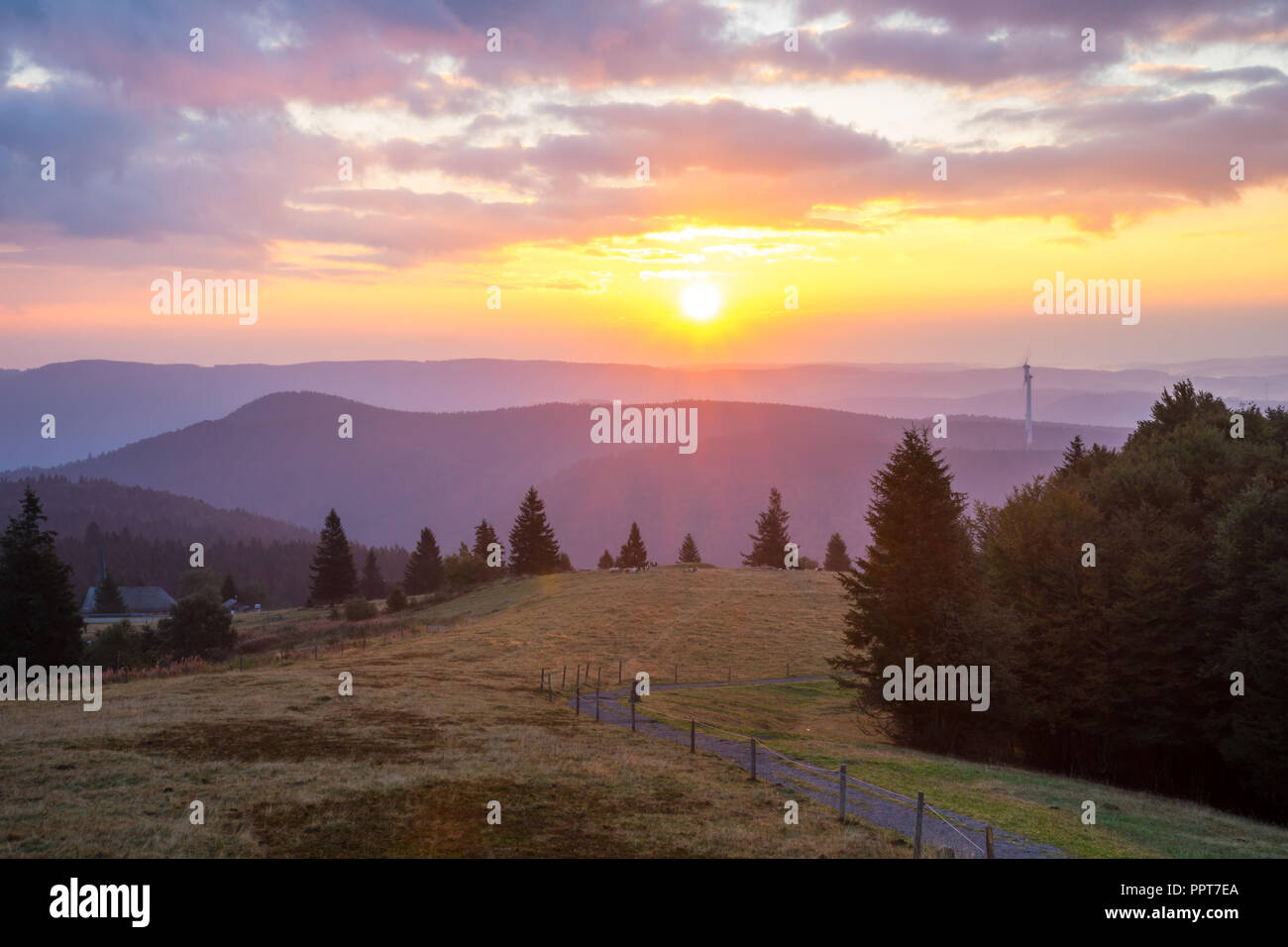 Germany, Romantic colorful sunrise on black forest mountain Kandel Stock Photo