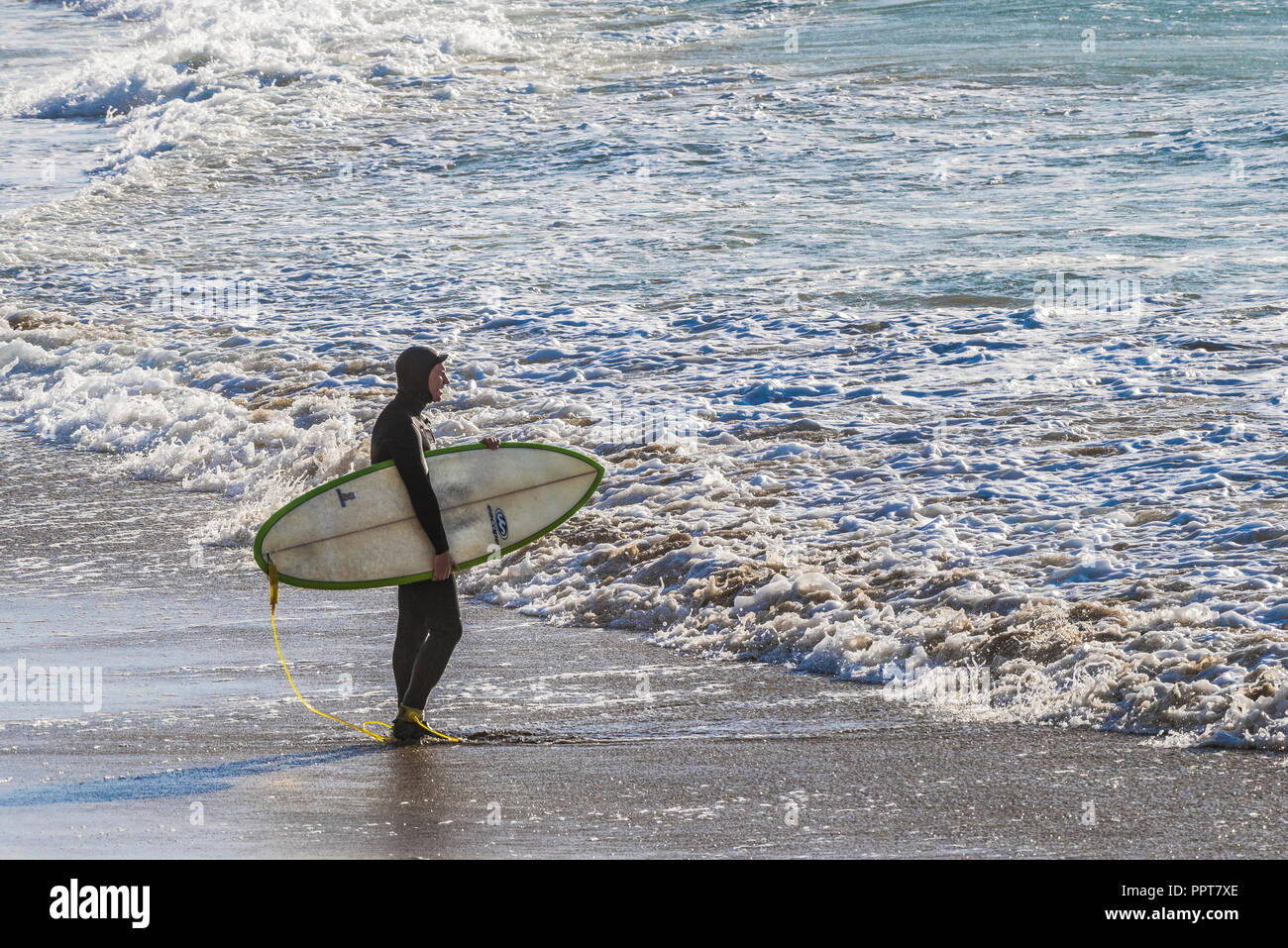 Surfer holding surfboard hi-res stock photography and images - Alamy