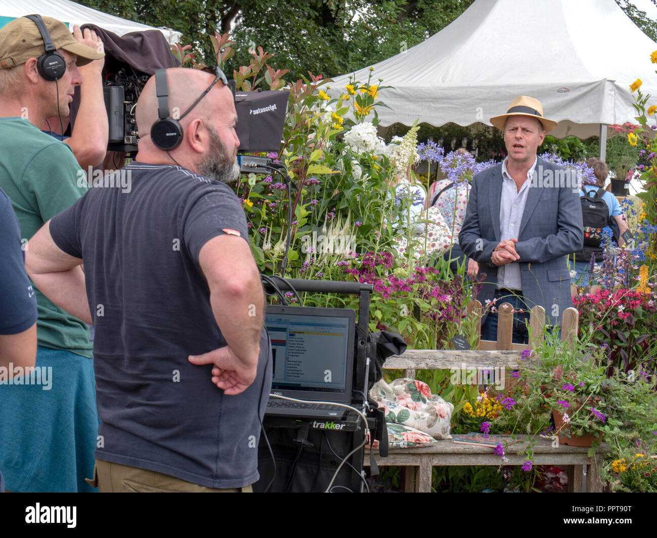 TV presenter and garden designer, Jo Swift, recording to camera for a TV show at RHS Tatton Park Flower show. Stock Photo