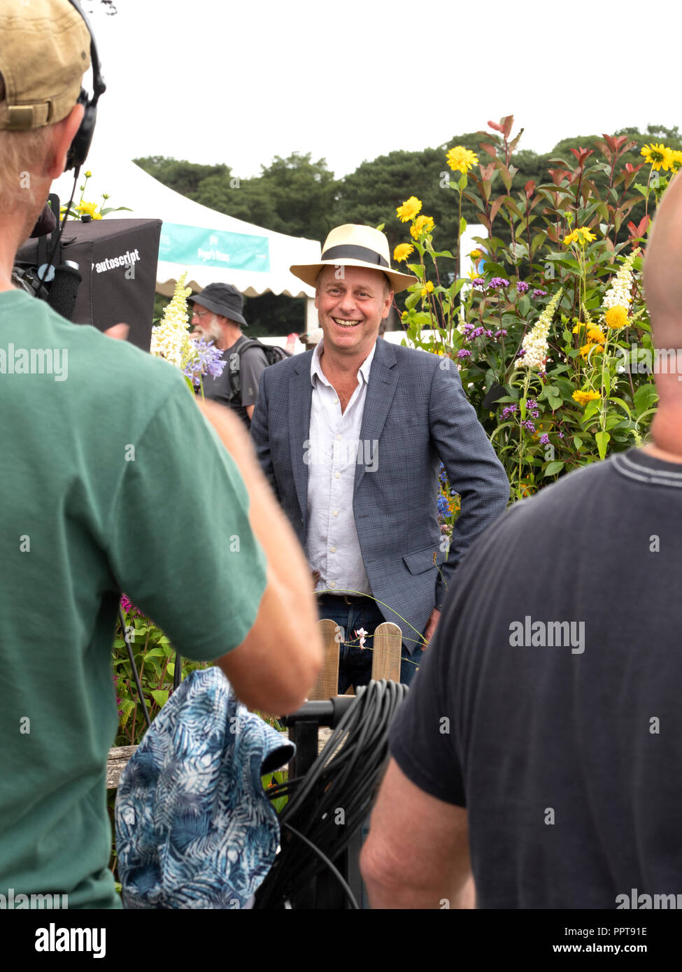 TV presenter and garden designer, Jo Swift, recording to camera for a TV show at RHS Tatton Park Flower show. Stock Photo