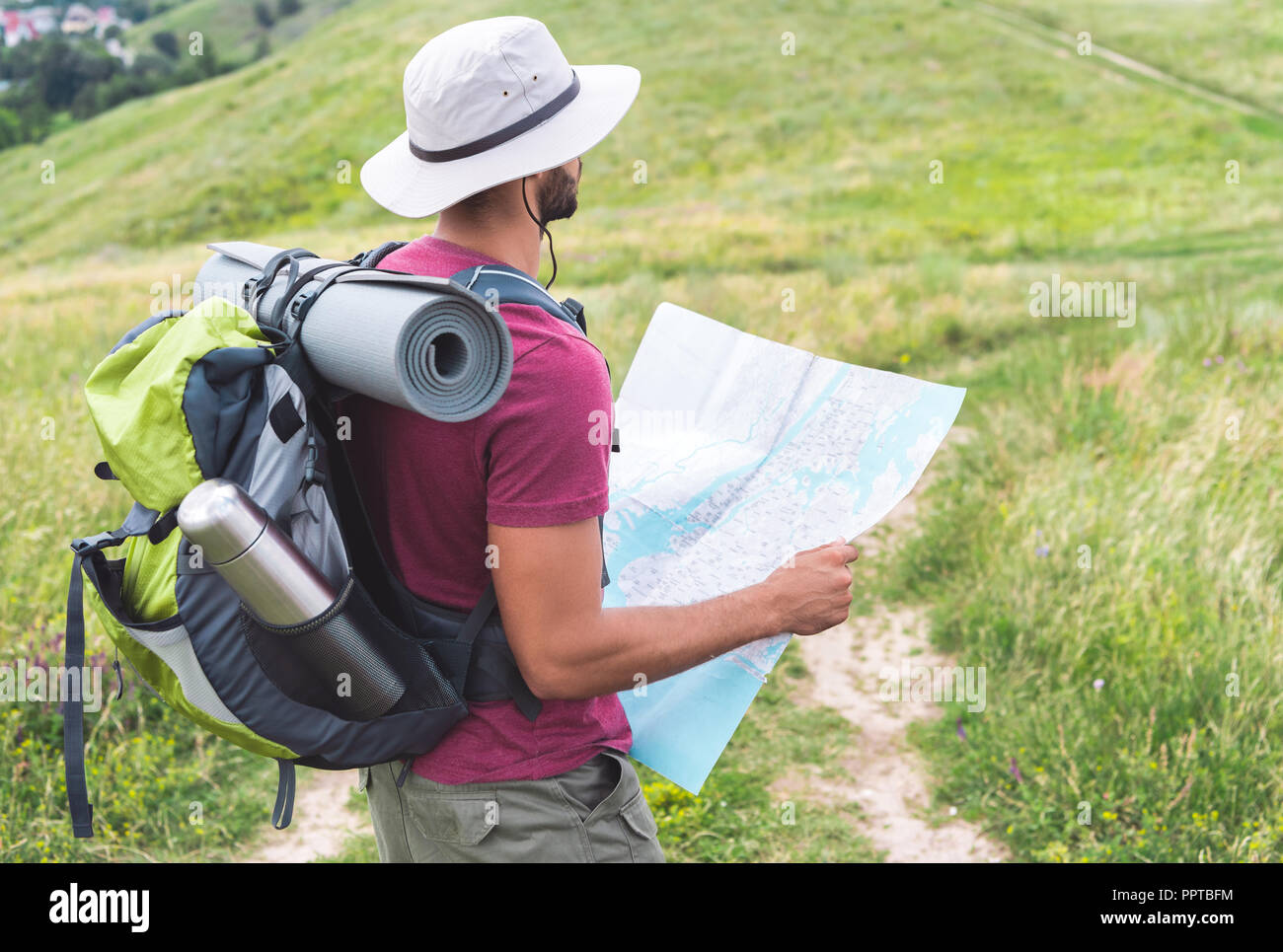 Male hiker backpack map hi-res stock photography and images - Alamy