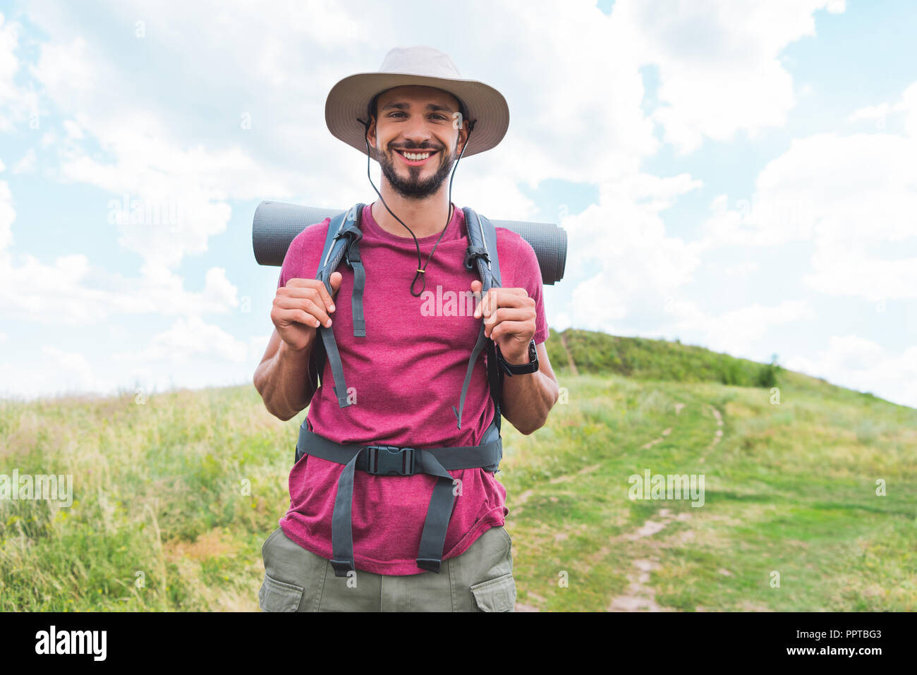 Male explorer smiling walking hi-res stock photography and images - Alamy