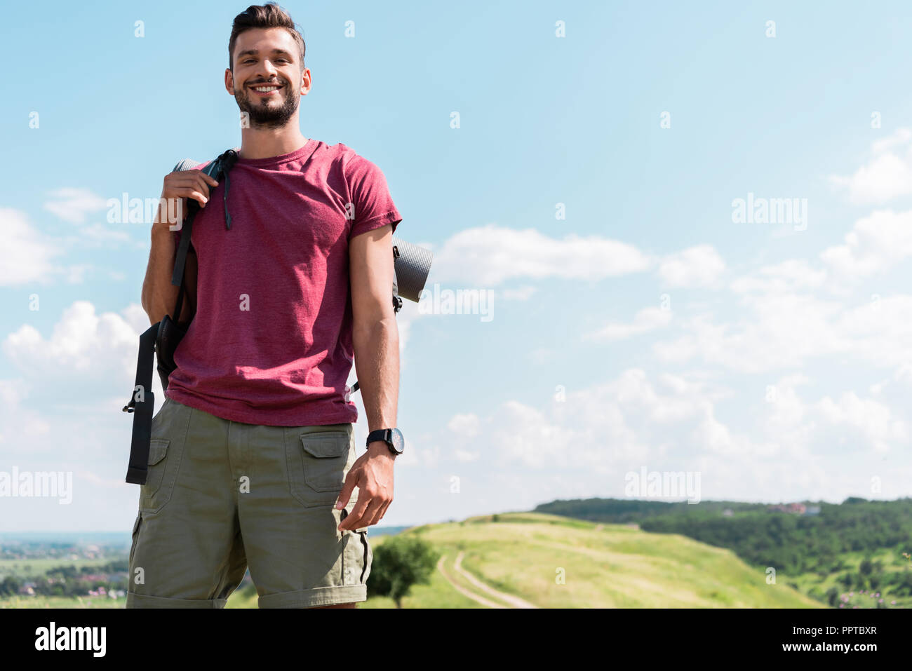 Young trekker backpack standing hi-res stock photography and images - Alamy