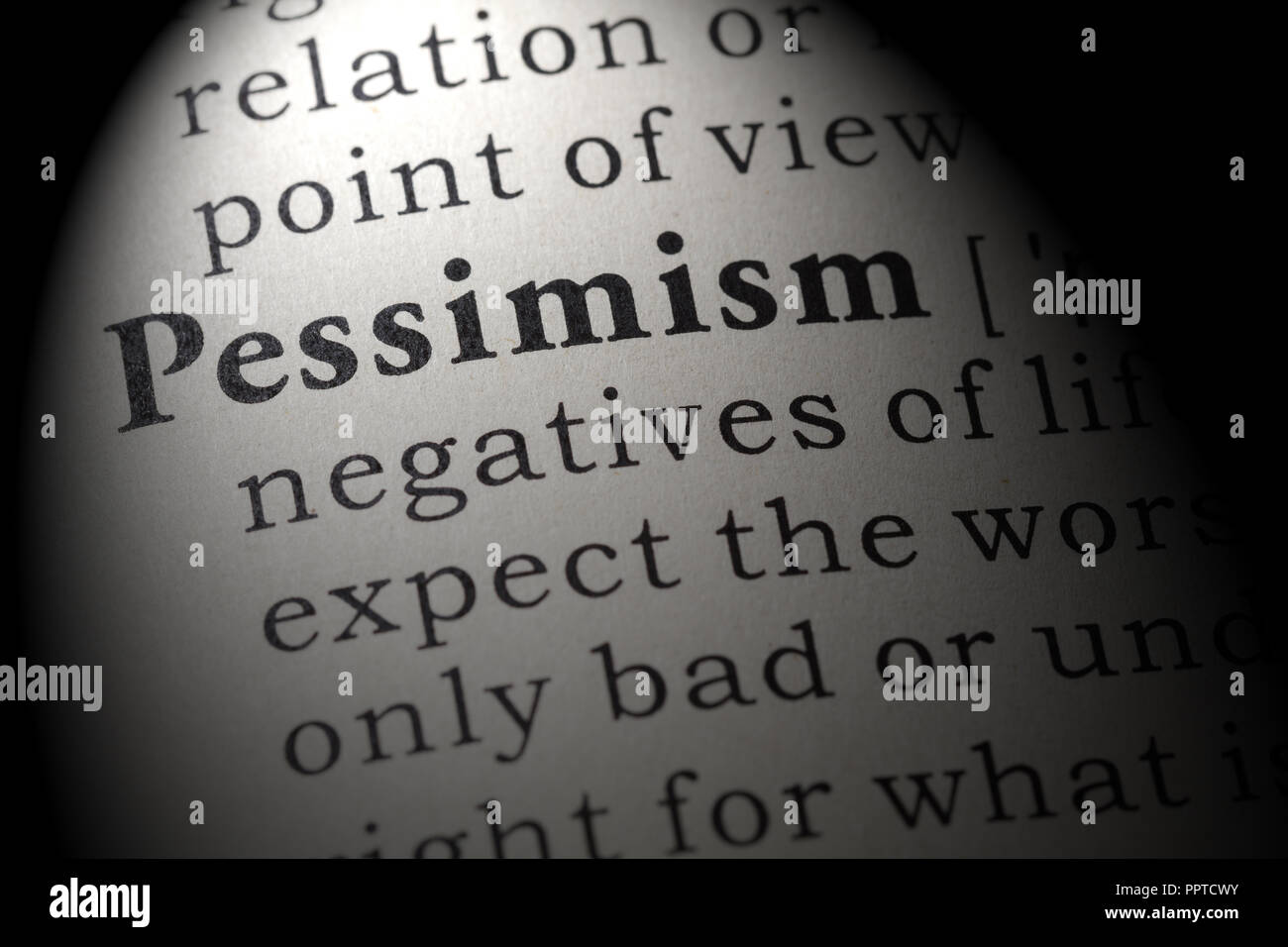 Fake Dictionary, Dictionary definition of the word pessimism. including key descriptive words. Stock Photo