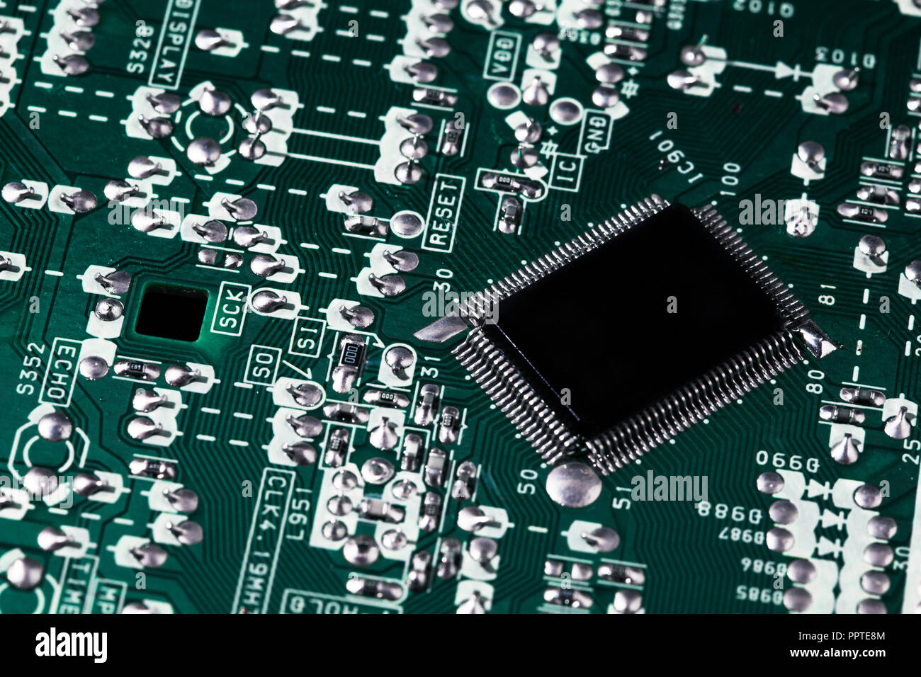 Microchip integrated on motherboard computer science Stock Photo
