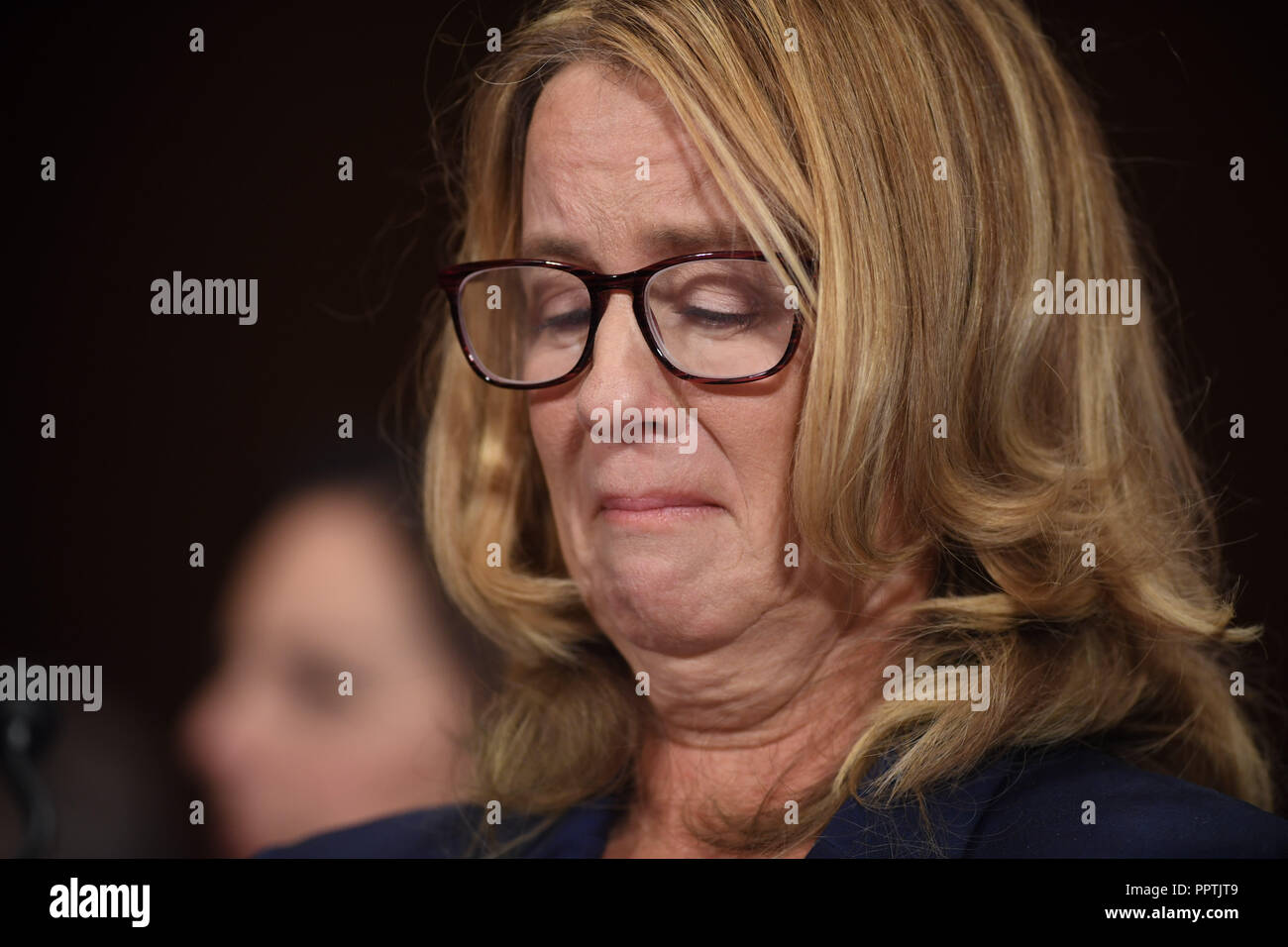 Christine Blasey Ford, the woman accusing Supreme Court nominee Brett Kavanaugh of sexually assaulting her at a party 36 years ago, testifies before the US Senate Judiciary Committee on Capitol Hill in Washington, DC, September 27, 2018.  / POOL / SAUL LOEB | usage worldwide Stock Photo