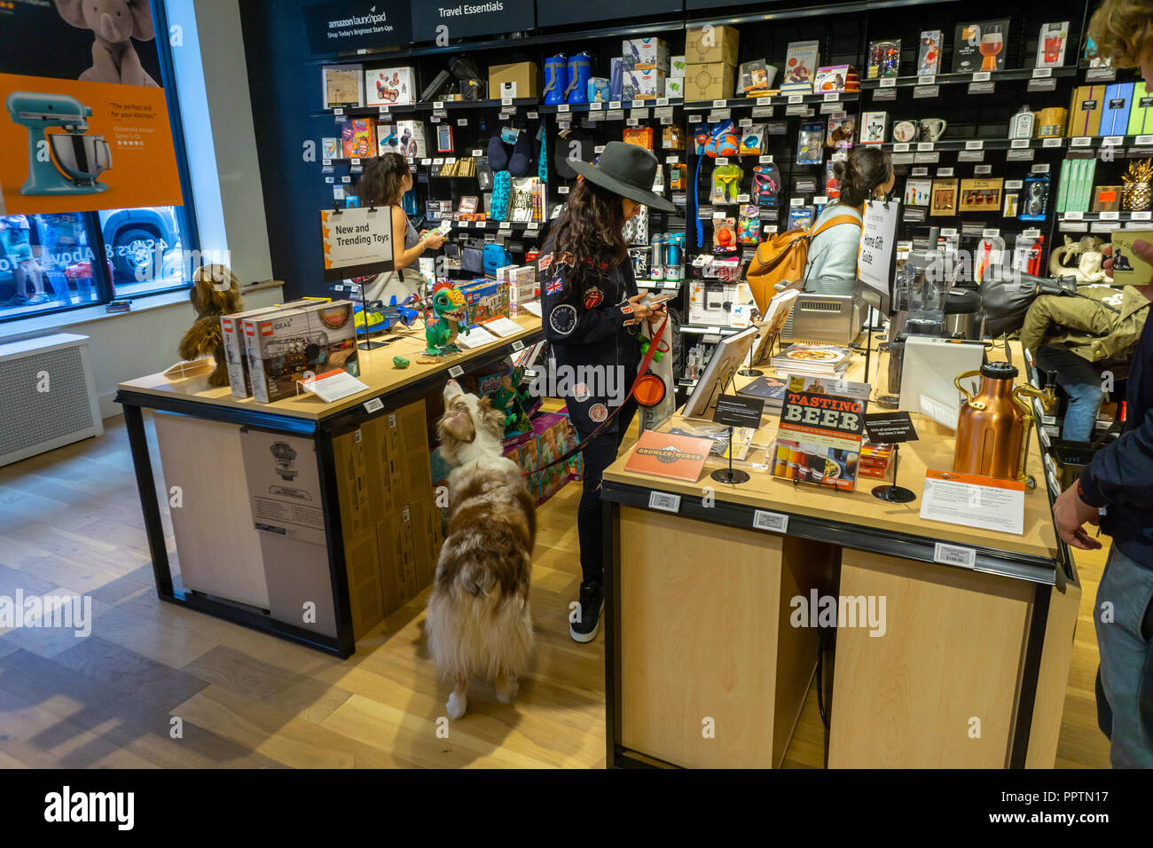 New York, USA. 27th Sept 2018. Customers shop and browse in the new Amazon  4-star store in the Soho shopping district in New York on opening day,  Thursday, September 27, 2018. The