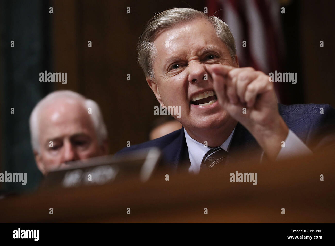 Washington, DC. 27th Sep, 2018. WASHINGTON, DC - SEPTEMBER 27: Senate Judiciary Committee member Sen. Lindsey Graham (R-SC) shouts while questioning Judge Brett Kavanaugh during his Supreme Court confirmation hearing in the Dirksen Senate Office Building on Capitol Hill September 27, 2018 in Washington, DC. Kavanaugh was called back to testify about claims by Christine Blasey Ford, who has accused him of sexually assaulting her during a party in 1982 when they were high school students in suburban Maryland. (Photo by Win McNamee/Getty Images) | usage worldwide Credit: dpa/Alamy Live News Stock Photo