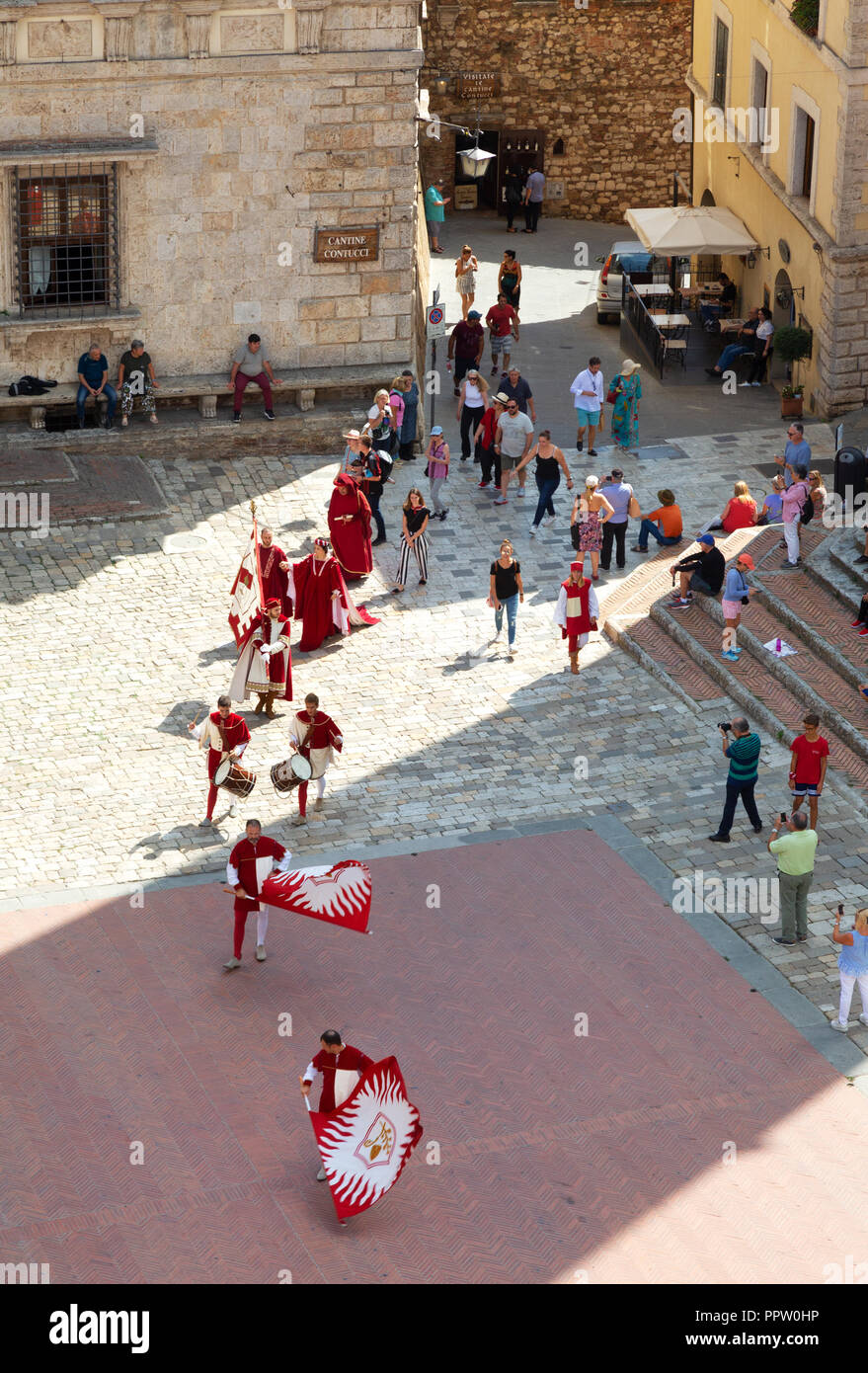 Traditional costume parade in Montepulciano medieval town, Piazza Grande, Montepulciano, Tuscany Italy Europe Stock Photo