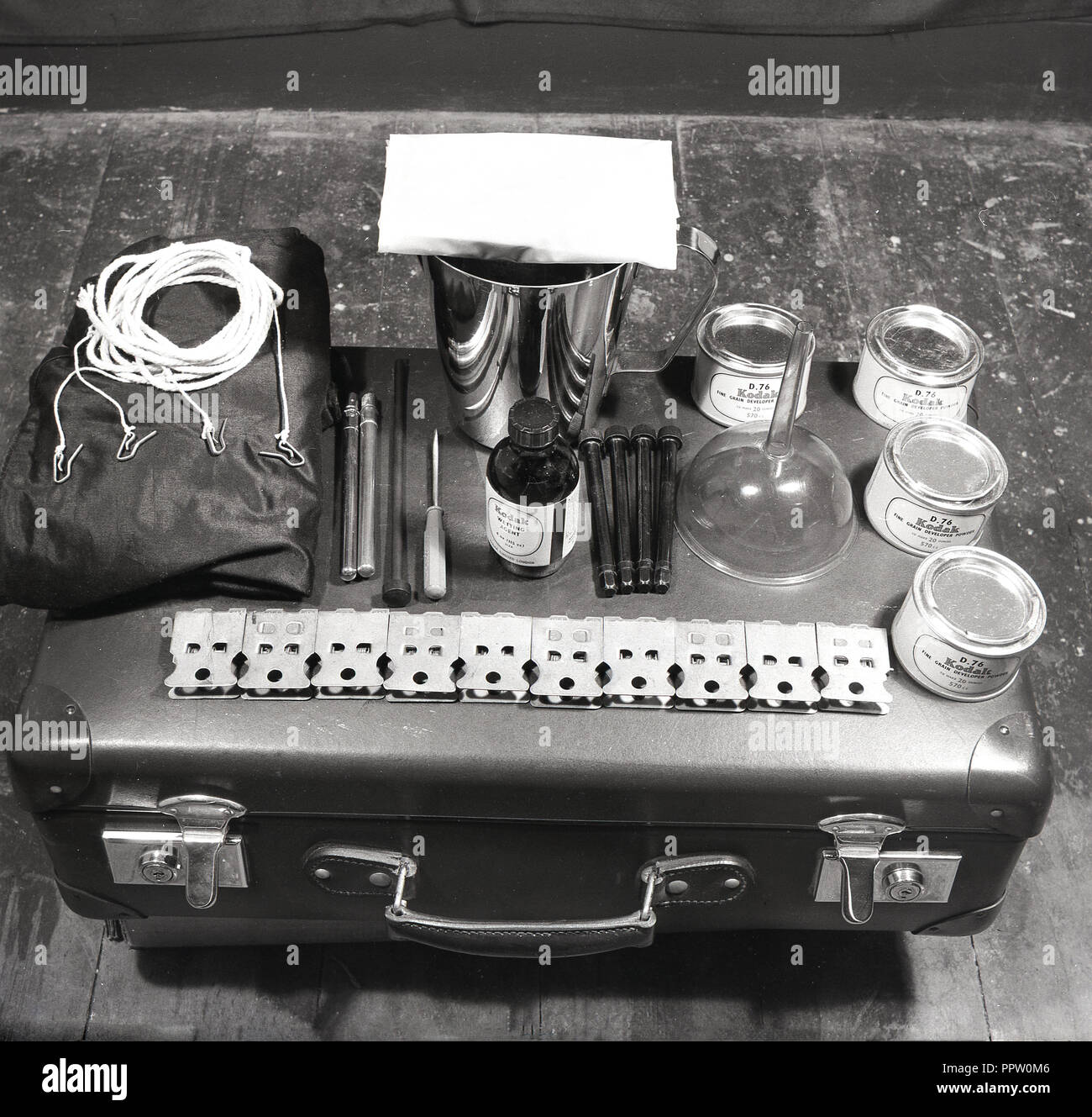 1950s, historical, Film Photography, picture shows a film developing kit, portable, with the equipment needed, including wetting agent, grain developer powder to develop rolls of film. Stock Photo