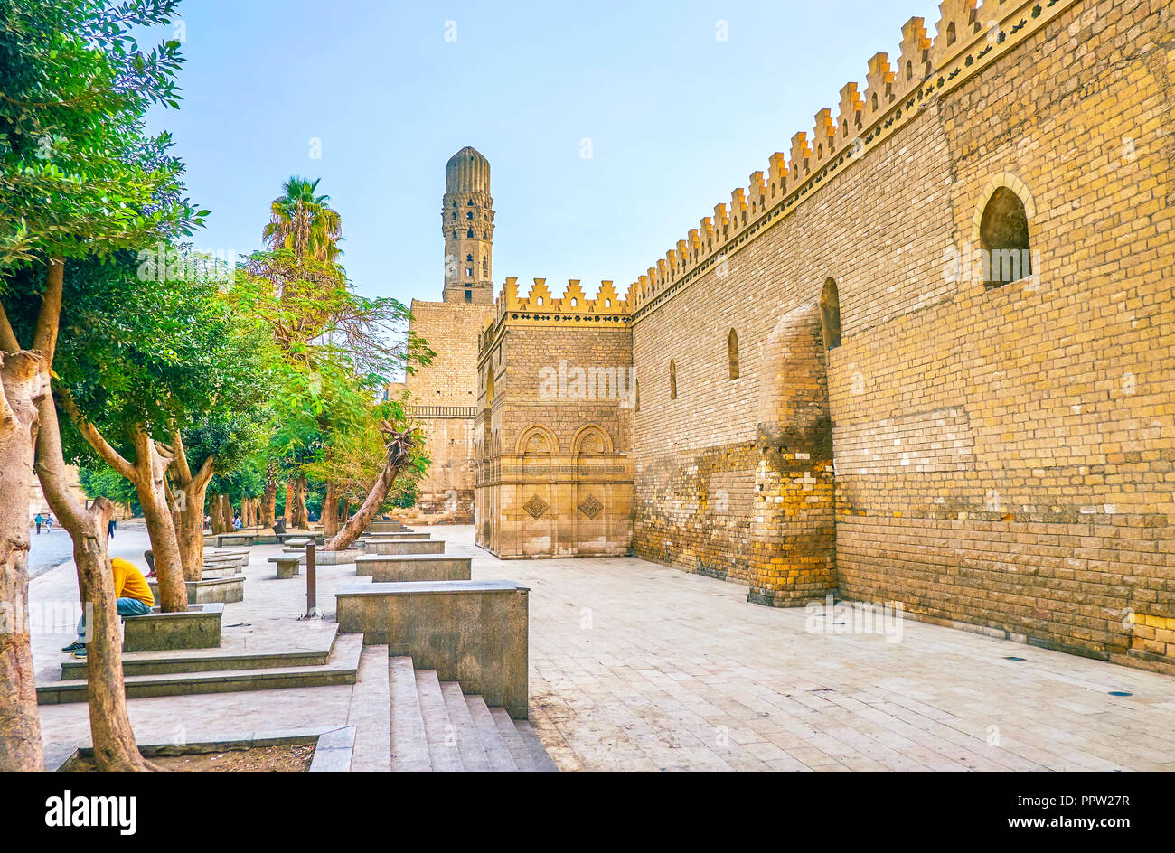 The huge medieval defensive walls of Mosque of al-Hakim, also known as al-Anwar, located in Islamic district of Cairo, Egypt Stock Photo