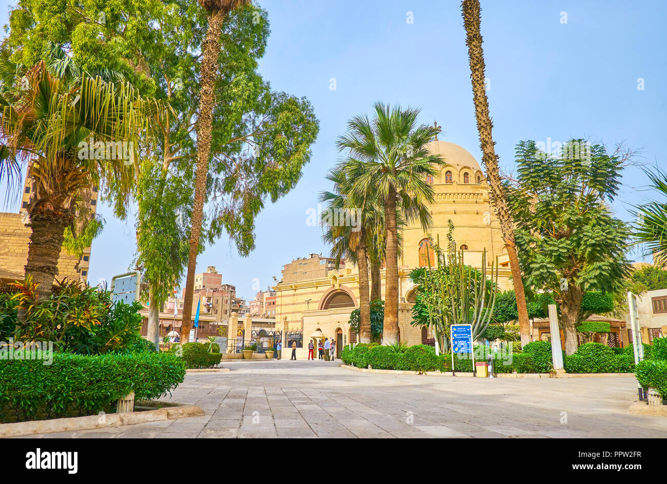 CAIRO, EGYPT - DECEMBER 23, 2017: The courtyard of Coptic Museum with huge Church of Saint George on the background, on December 23 in Cairo Stock Photo