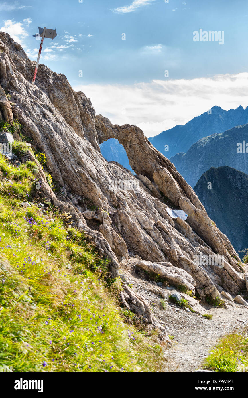 Natural rock erosion called Dragons or Zmeilor Window in Fragaras (Carpathians) mountains in Romania Stock Photo