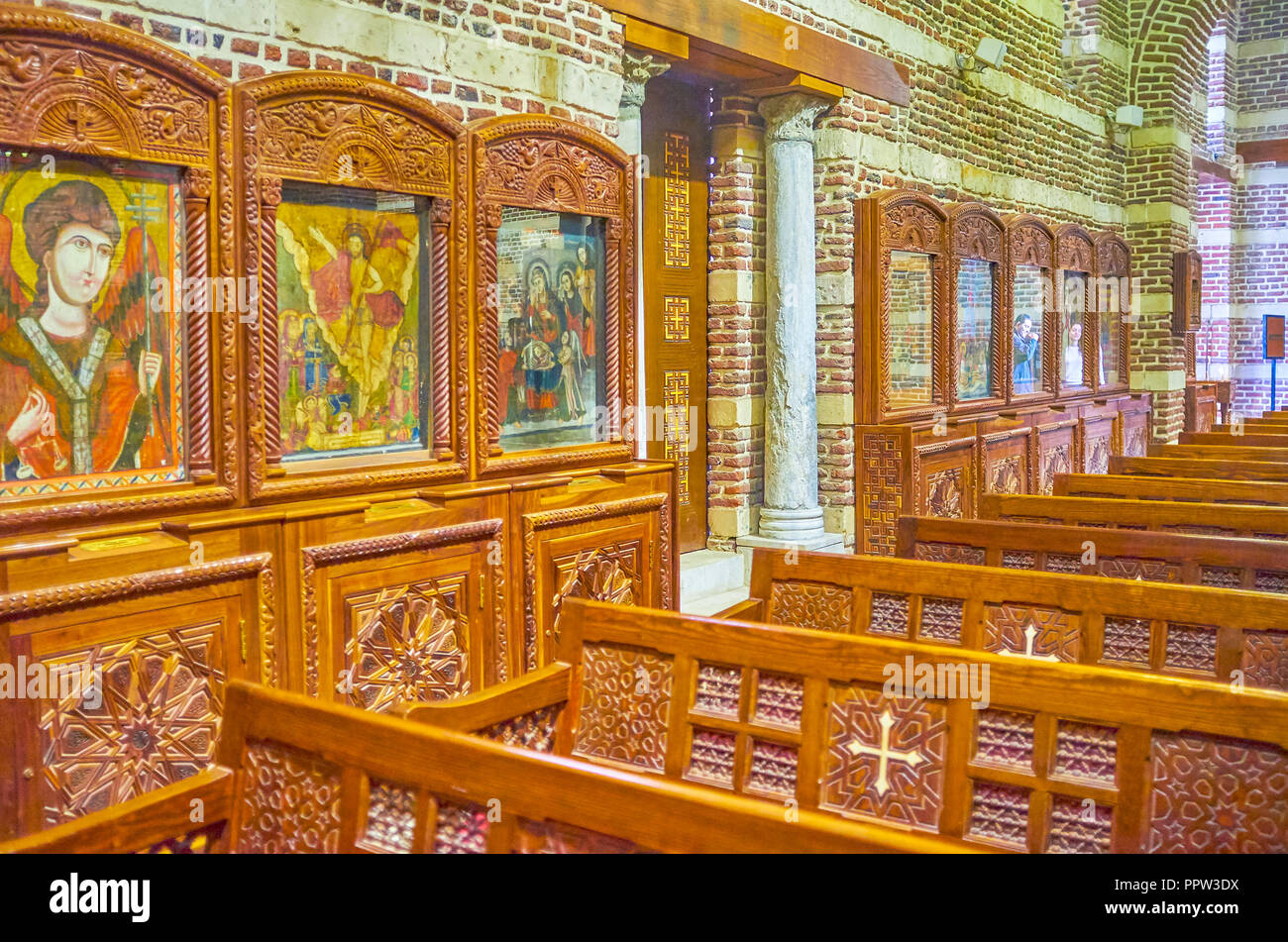 CAIRO, EGYPT - DECEMBER 23, 2017: The beautiful ancient Byzantine style icons in the prayer hall of St Barbara Church, on December 23 in Cairo. Stock Photo