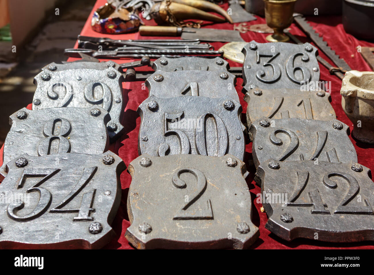 Vintage house numbers for sale at the flea market Stock Photo Alamy
